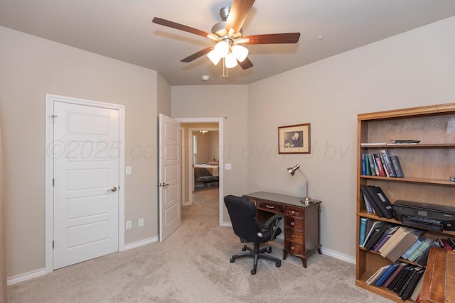 office space with ceiling fan, carpet, and baseboards