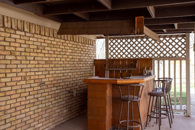 view of patio with outdoor dry bar