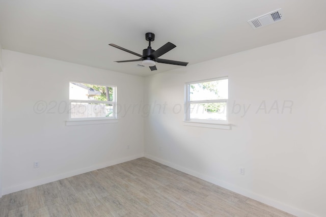 3807 Hancock St, Amarillo, TX 79109 - unfurnished room with light wood-style flooring, healthy amount of natural light, baseboards, and a ceiling fan