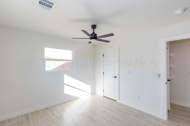 3807 Hancock St, Amarillo, TX 79109 - unfurnished room featuring a ceiling fan, baseboards, and light wood finished floors