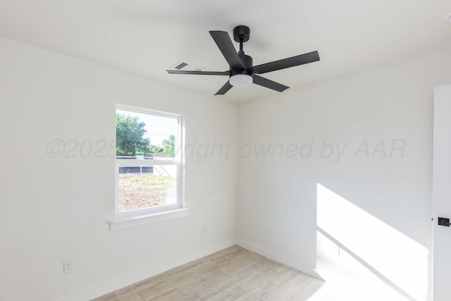 3807 Hancock St, Amarillo, TX 79109 - empty room with light wood-style floors, baseboards, and ceiling fan
