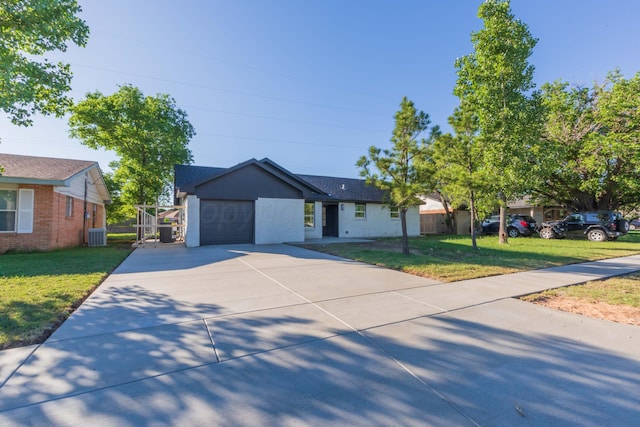 3807 Hancock St, Amarillo, TX 79109 - view of front facade featuring a garage, driveway, and cooling unit