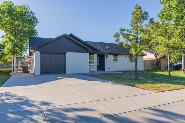 3807 Hancock St, Amarillo, TX 79109 - single story home with concrete driveway, a garage, and roof with shingles