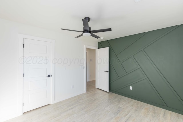 3807 Hancock St, Amarillo, TX 79109 - unfurnished bedroom with light wood-type flooring, a ceiling fan, and baseboards