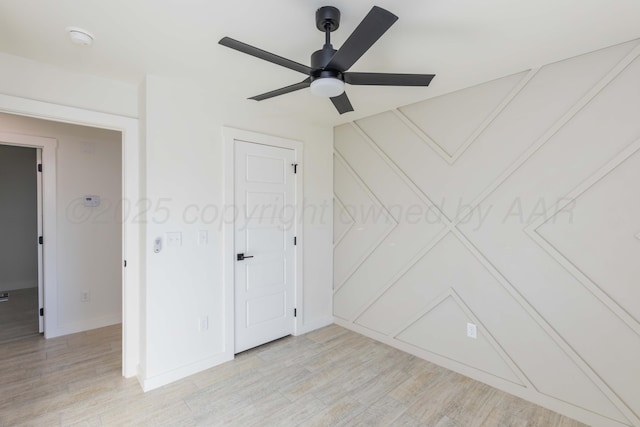 3807 Hancock St, Amarillo, TX 79109 - unfurnished bedroom with light wood finished floors, baseboards, and ceiling fan