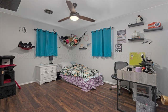 5021 Westway Trl, Amarillo, TX 79109 - bedroom featuring dark wood-style floors, baseboards, and a ceiling fan