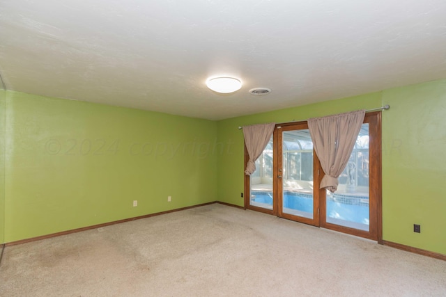 6011 Hatfield Cir, Amarillo, TX 79109 - unfurnished room with light colored carpet and baseboards