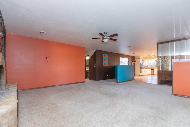 6011 Hatfield Cir, Amarillo, TX 79109 - unfurnished living room with a ceiling fan and carpet flooring