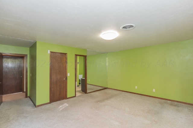 6011 Hatfield Cir, Amarillo, TX 79109 - unfurnished bedroom featuring light carpet and baseboards