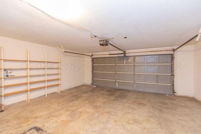 6011 Hatfield Cir, Amarillo, TX 79109 - garage featuring a garage door opener