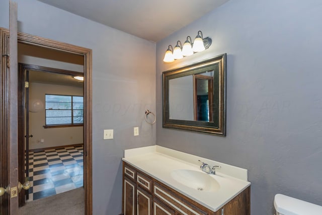 6011 Hatfield Cir, Amarillo, TX 79109 - half bathroom with vanity and tile patterned floors