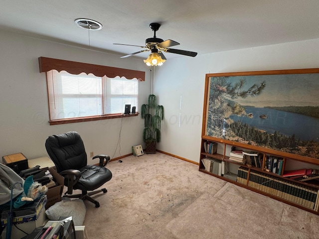 office area with ceiling fan and carpet floors