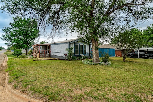 view of yard featuring a carport