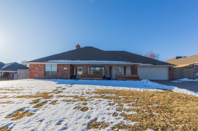 single story home with a garage