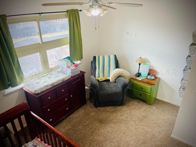 carpeted bedroom with ceiling fan