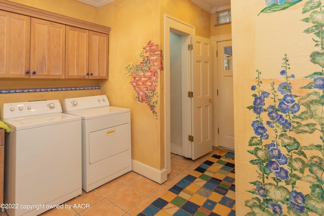 clothes washing area with separate washer and dryer, cabinets, crown molding, and light tile patterned floors