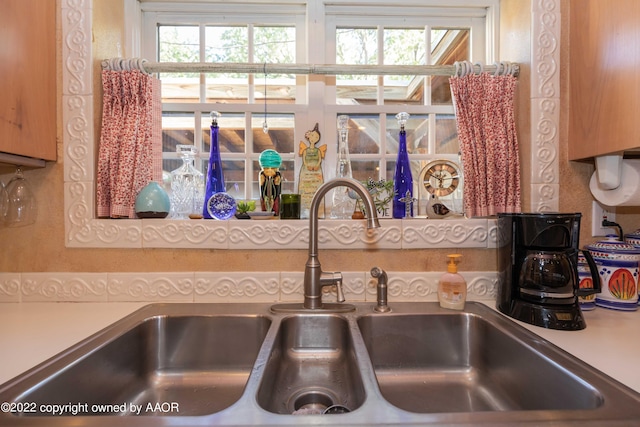 kitchen featuring sink and plenty of natural light