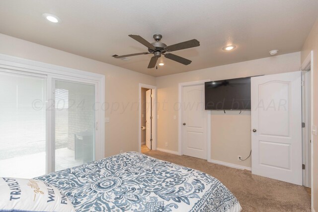 carpeted bedroom featuring ceiling fan