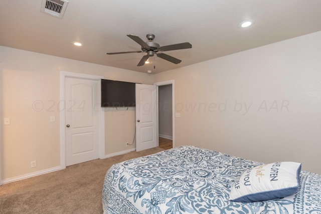 bedroom featuring ceiling fan, carpet flooring, and a closet