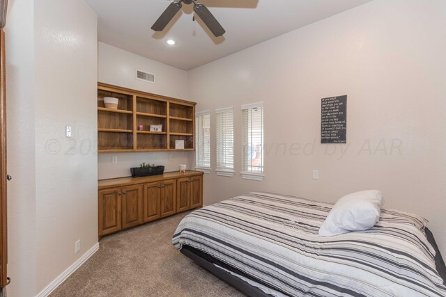 carpeted bedroom with ceiling fan