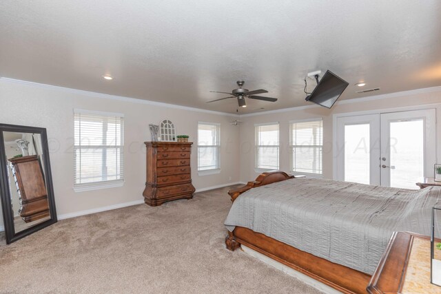 carpeted bedroom with crown molding, french doors, ceiling fan, and access to exterior