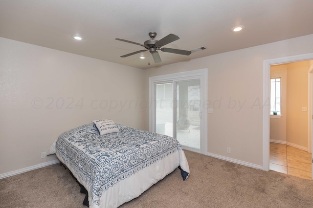 bedroom with access to outside, ceiling fan, and carpet