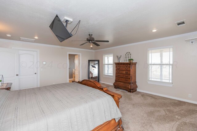 bedroom with multiple windows, carpet floors, ceiling fan, and connected bathroom