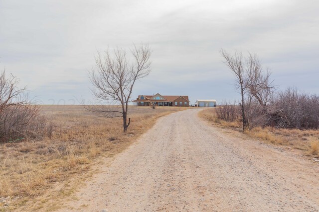 view of road featuring a rural view