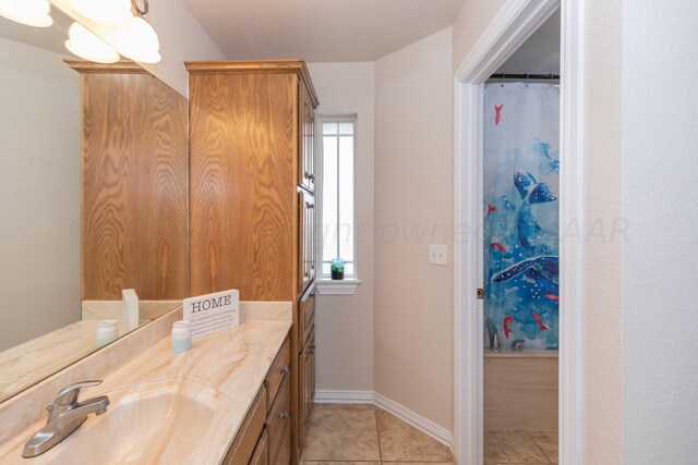 bathroom with vanity and tile patterned flooring