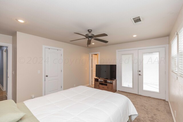 bedroom with carpet, french doors, and ceiling fan