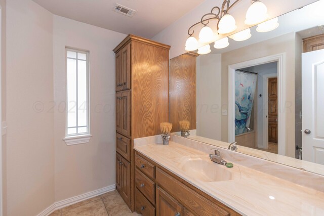 bathroom featuring vanity and tile patterned floors