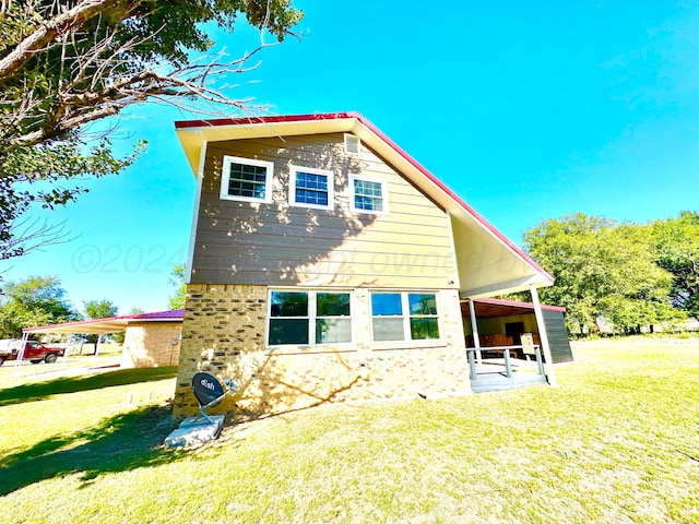 222 E 5th St, Higgins, TX 79046 - back of house with a yard
