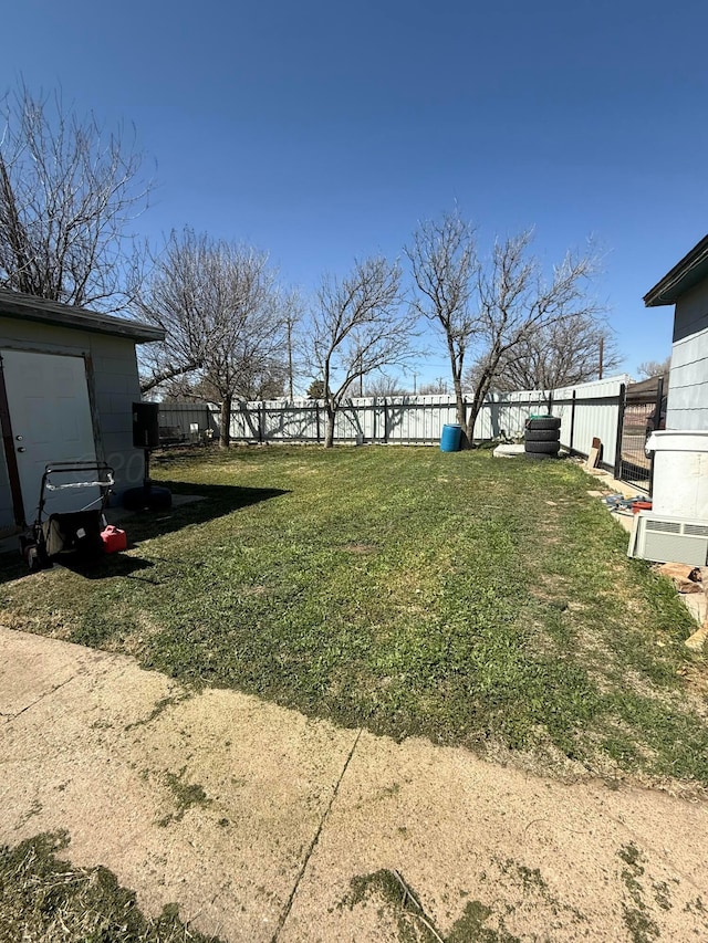 view of yard with a fenced backyard