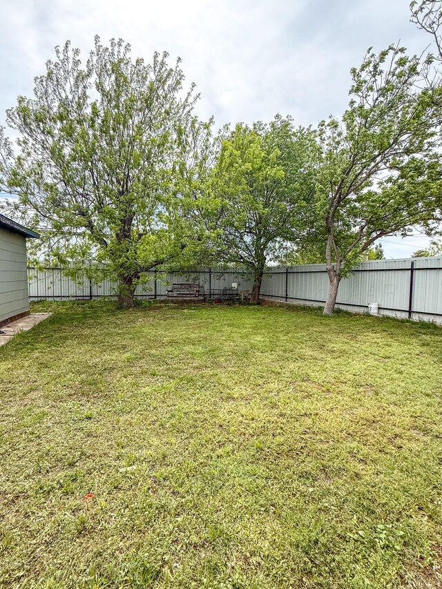 600 S Williston St, White Deer, TX 79097 - view of yard with a fenced backyard