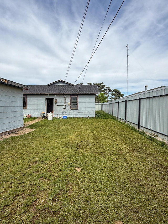 600 S Williston St, White Deer, TX 79097 - back of property featuring fence and a yard