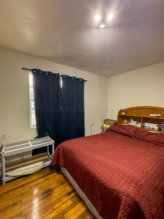 600 S Williston St, White Deer, TX 79097 - bedroom with wood-type flooring
