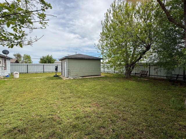 600 S Williston St, White Deer, TX 79097 - view of yard with a fenced backyard and an outdoor structure