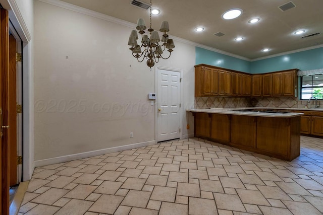 7402 Park Ridge Dr, Amarillo, TX 79119 - kitchen with backsplash, a sink, a peninsula, light countertops, and crown molding