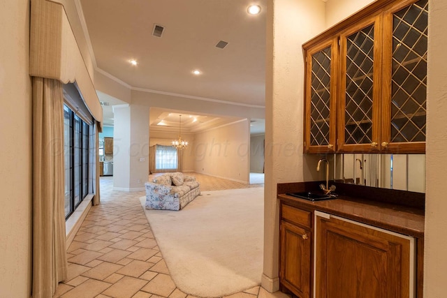 7402 Park Ridge Dr, Amarillo, TX 79119 - indoor wet bar featuring ornamental molding, a chandelier, baseboards, and recessed lighting