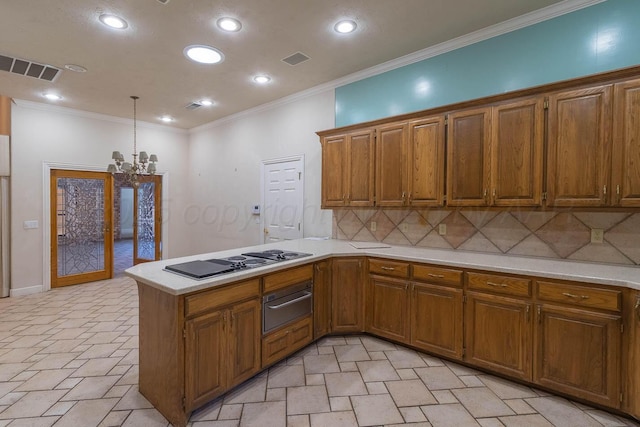7402 Park Ridge Dr, Amarillo, TX 79119 - kitchen featuring a warming drawer, brown cabinets, black electric stovetop, light countertops, and recessed lighting