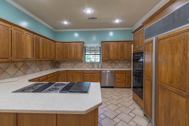 7402 Park Ridge Dr, Amarillo, TX 79119 - kitchen with stainless steel dishwasher, stovetop with downdraft, a sink, light countertops, and tasteful backsplash