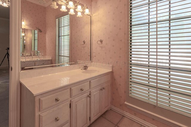 7402 Park Ridge Dr, Amarillo, TX 79119 - bathroom with wallpapered walls, vanity, ornamental molding, and tile patterned flooring