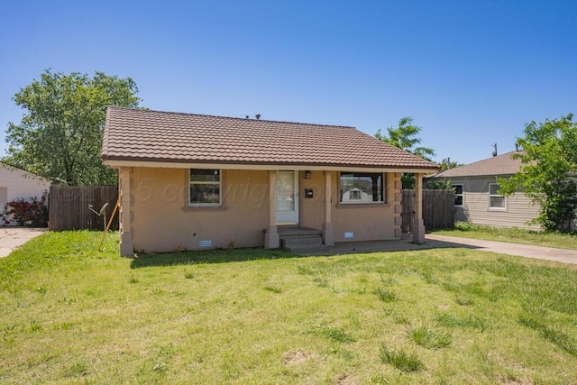 bungalow-style home featuring stucco siding and a tile roof