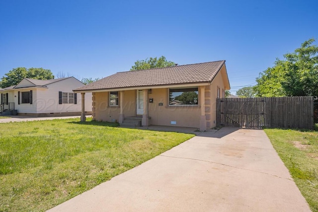 bungalow-style home featuring a tile roof, stucco siding, a gate, and driveway