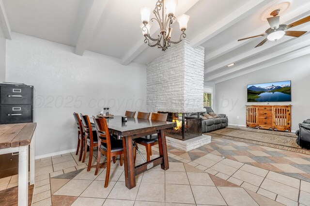 123 Bellaire Ave, Dumas, TX 79029 - dining space featuring light tile patterned floors, ceiling fan, and a chandelier