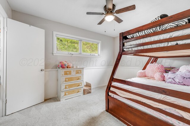 123 Bellaire Ave, Dumas, TX 79029 - carpeted bedroom featuring a ceiling fan