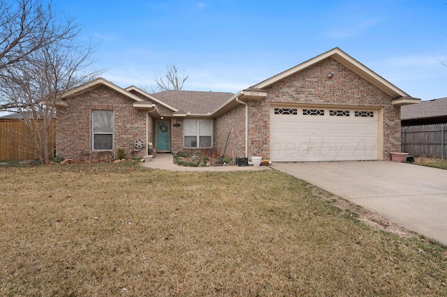 ranch-style house with a garage, brick siding, fence, and driveway