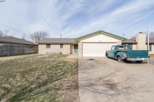 ranch-style house with driveway, a front yard, a chimney, fence, and a garage