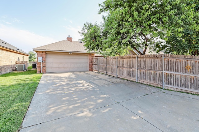 9315 Gaston Ave, Amarillo, TX 79119 - exterior space with cooling unit and a yard