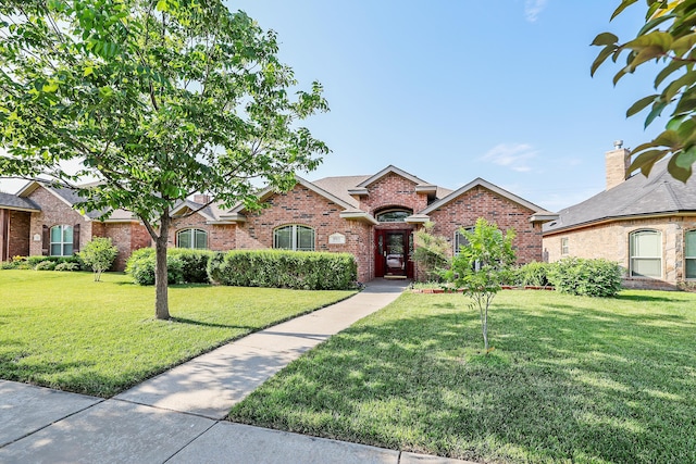 9315 Gaston Ave, Amarillo, TX 79119 - view of front facade with a front yard